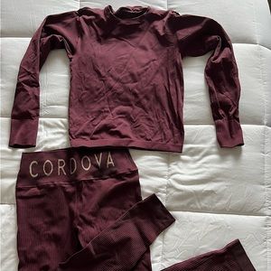 Cordova base layers in Aubergine. Size is M/L but runs small. Only worn once!
